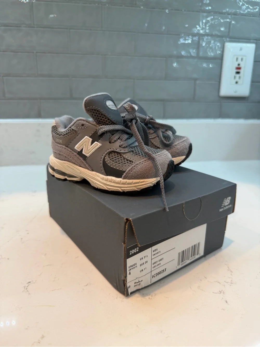 New Balance Kids Gray and White 2002R Athletic Sneakers